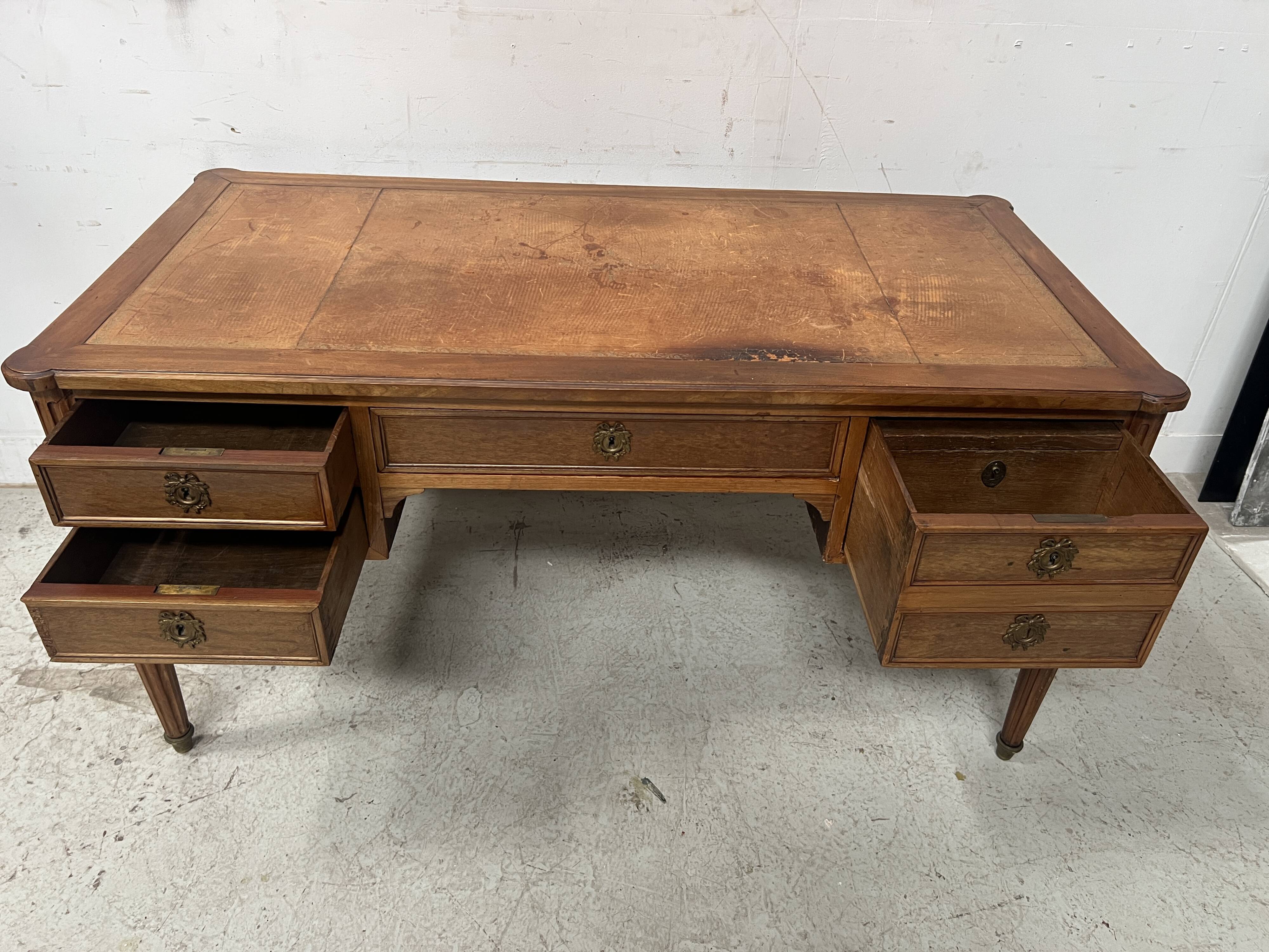 Louis XVI style walnut desk from the late 19th century.