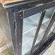 Display cabinet in patinated wood
