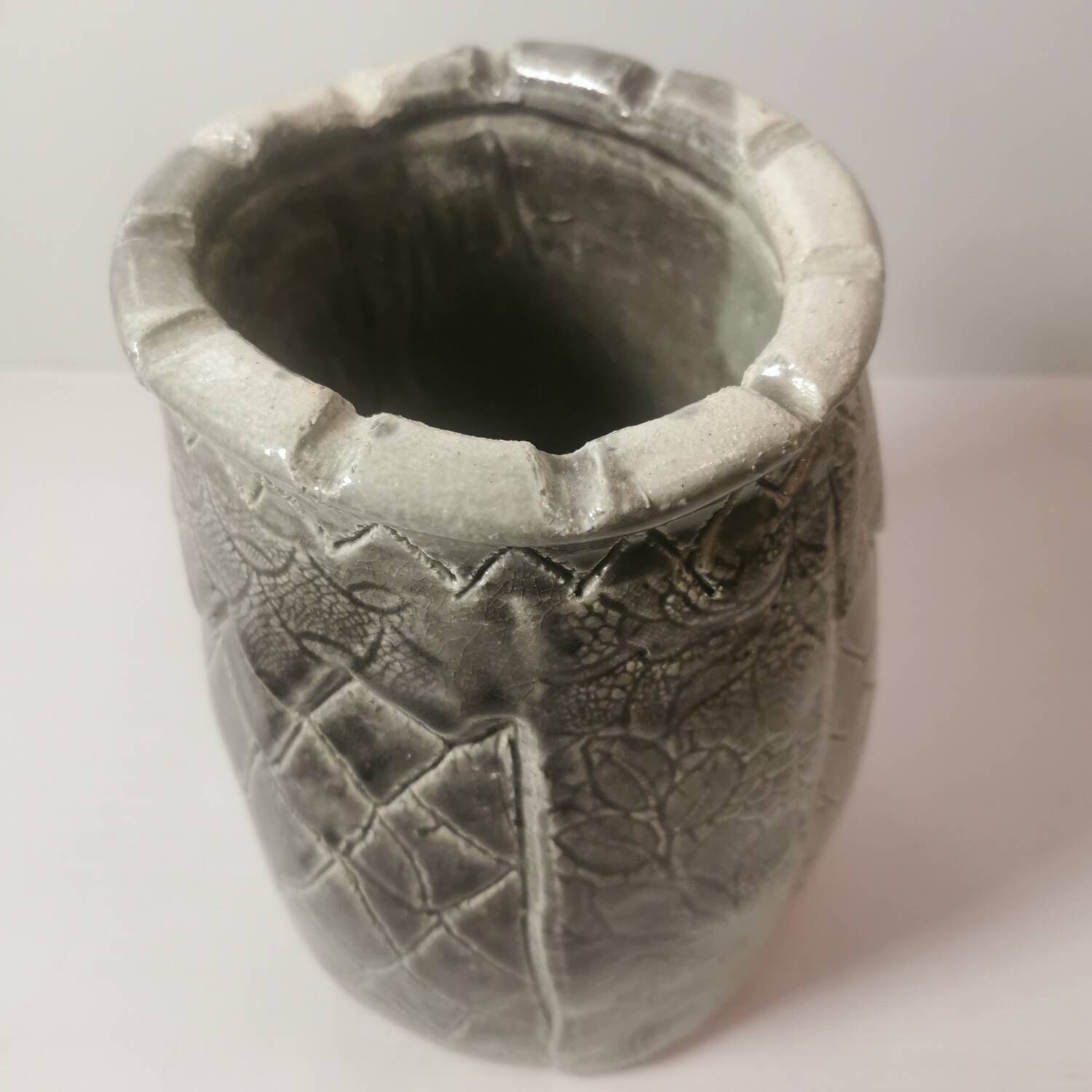 Ceramic vase or pot in gray beige color