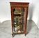 Louis XV style display cabinet in wood and bronze, with several shelves