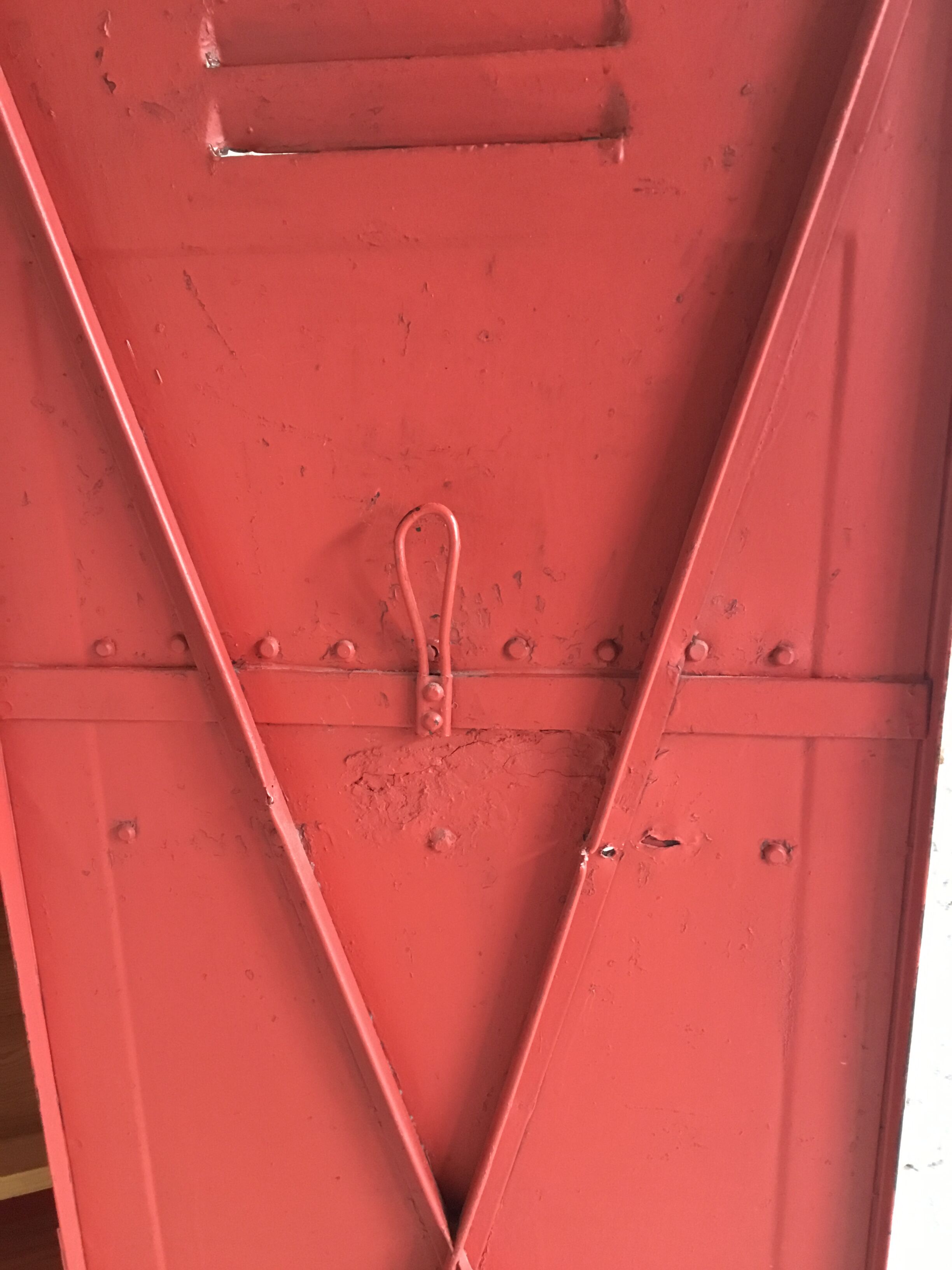 Riveted cloakroom converted into storage cabinet - early twentieth century