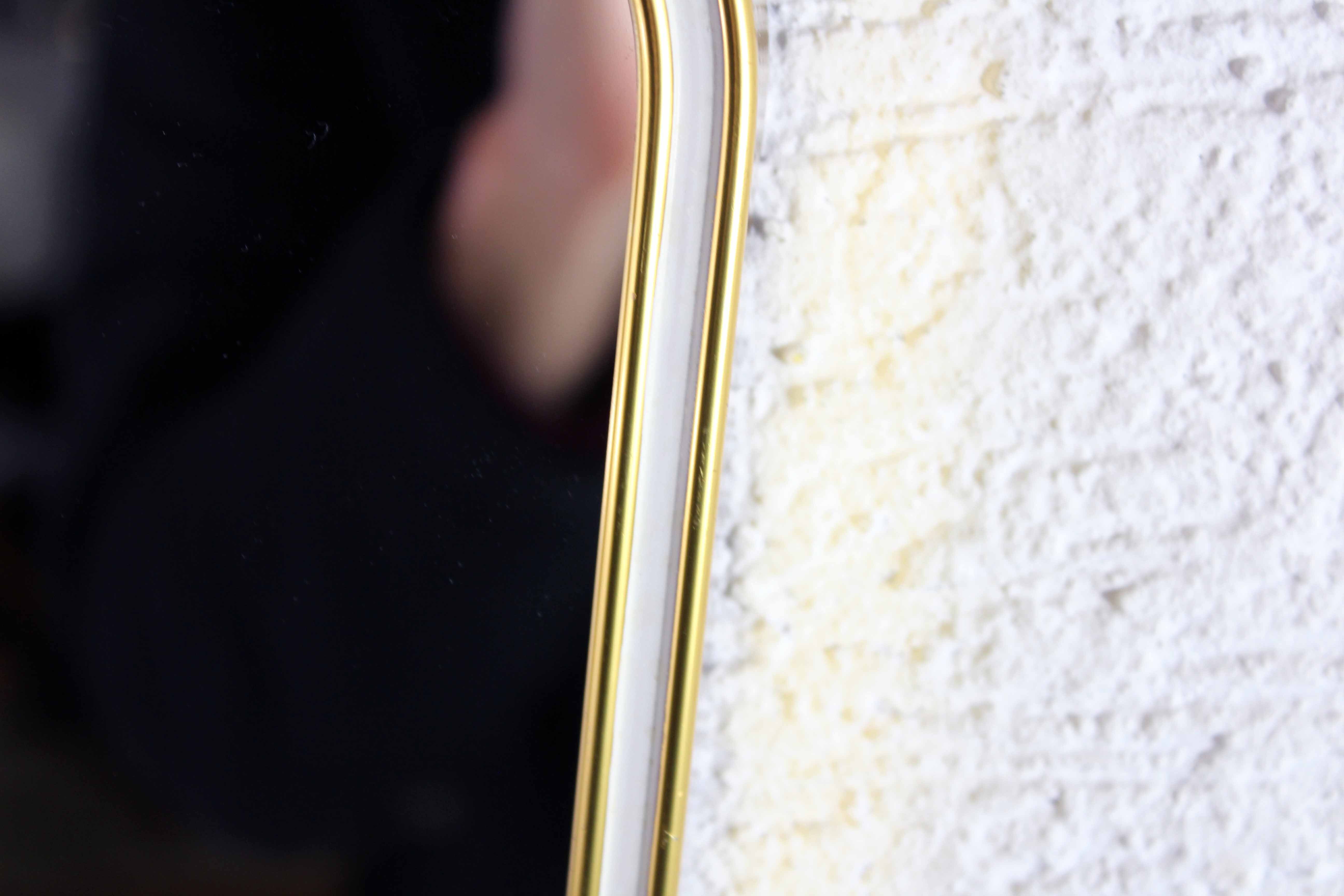 Freeform brass mirror, 42x28 cm