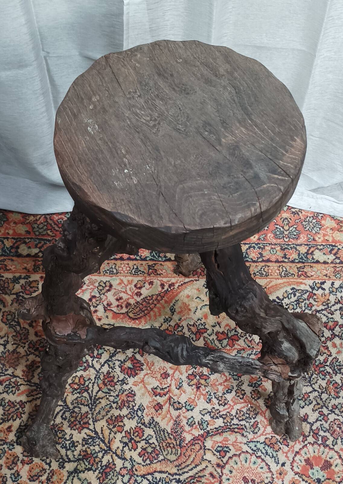 Brutalist bar stool made of vine wood