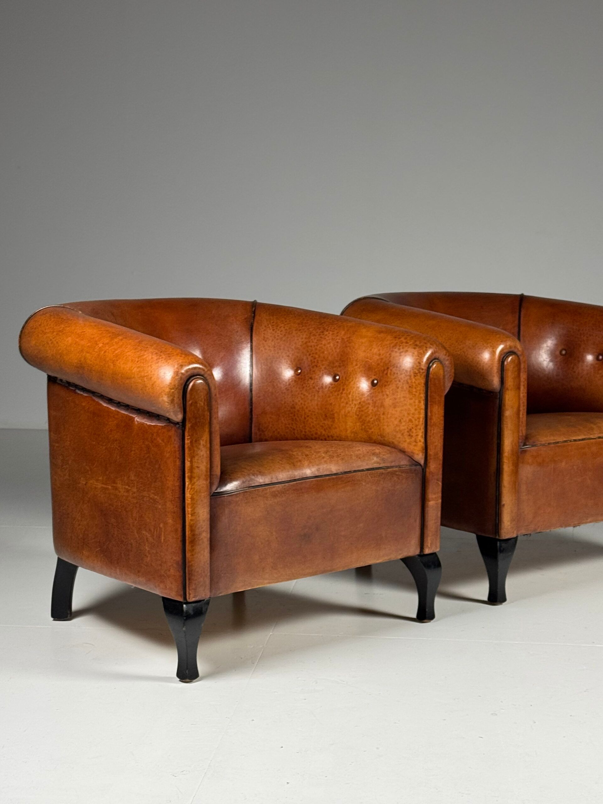 Ensemble de 2 fauteuils club en peau de mouton