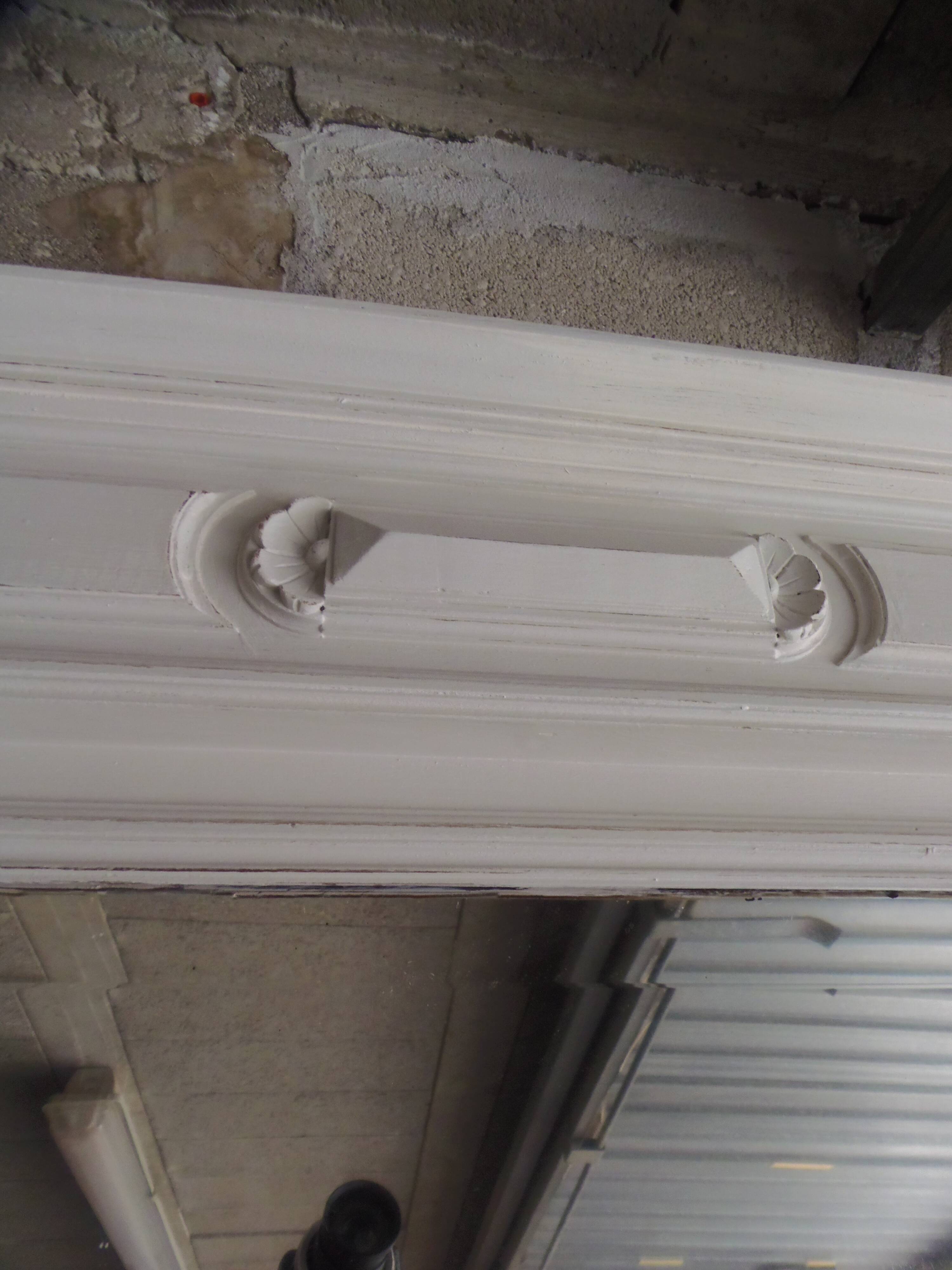 Antique bevelled mirror, frame in pearl grey patinated wood.