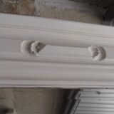 Antique bevelled mirror, frame in pearl grey patinated wood.