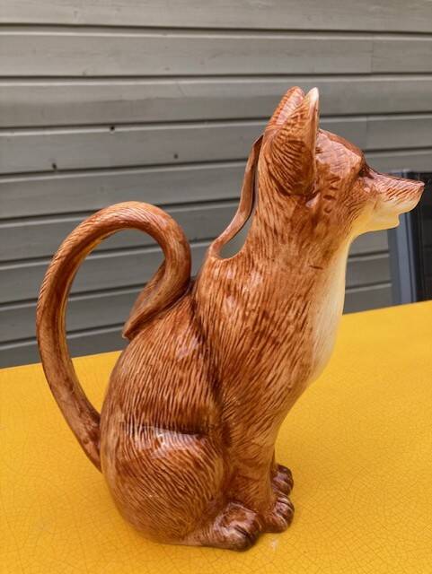 Ceramic jug in the shape of a fox.