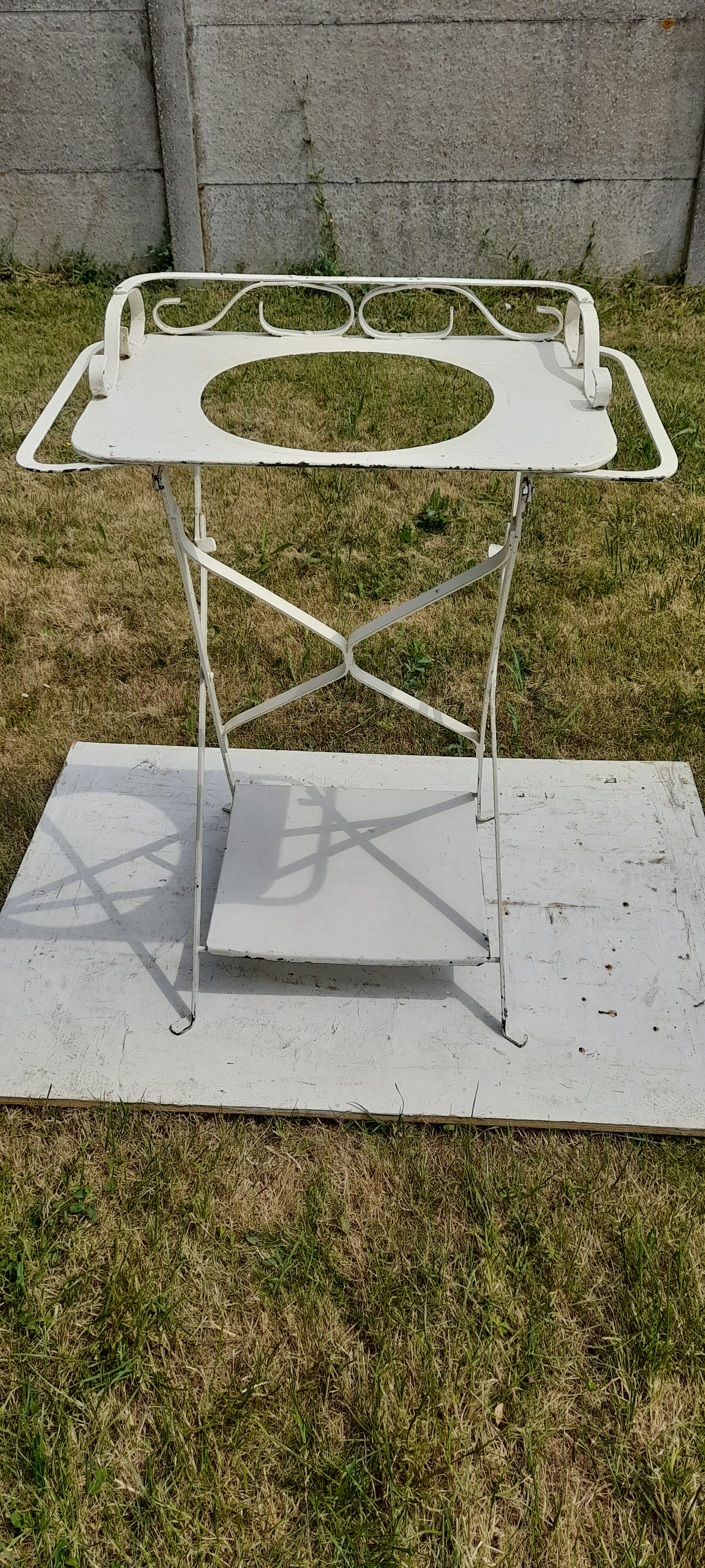 Folding metal vanity cabinet