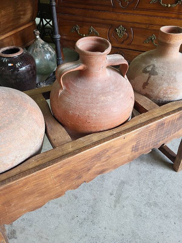 Old wooden jar holder with 3 clay jars