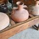 Old wooden jar holder with 3 clay jars