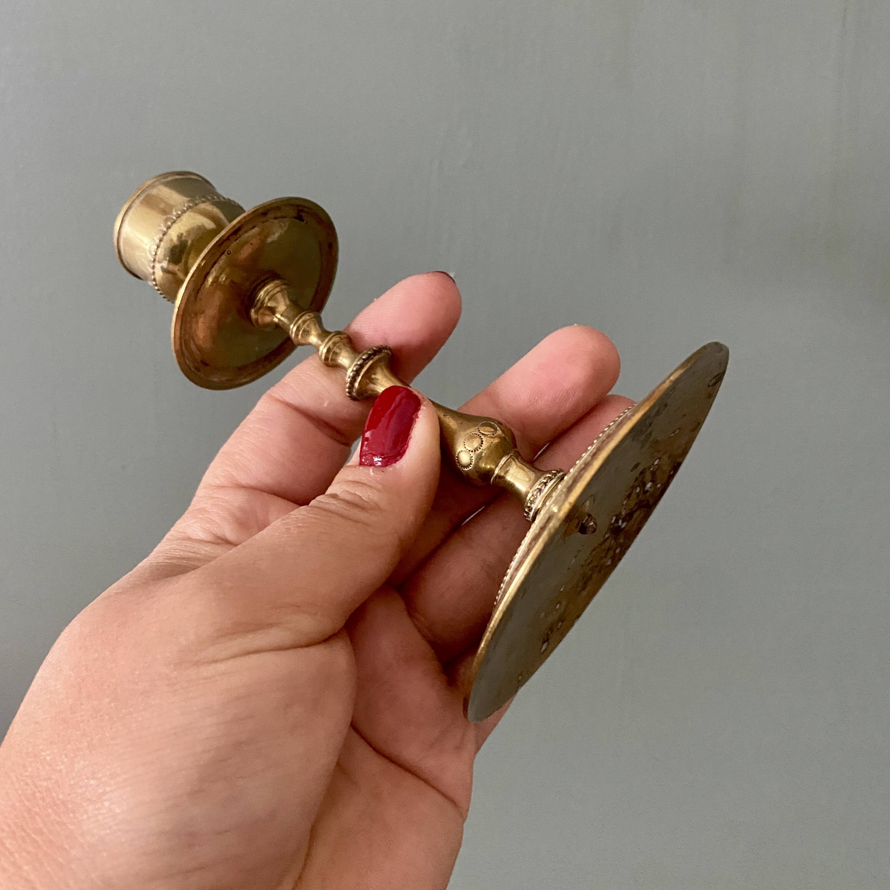 Antique brass candlestick holder