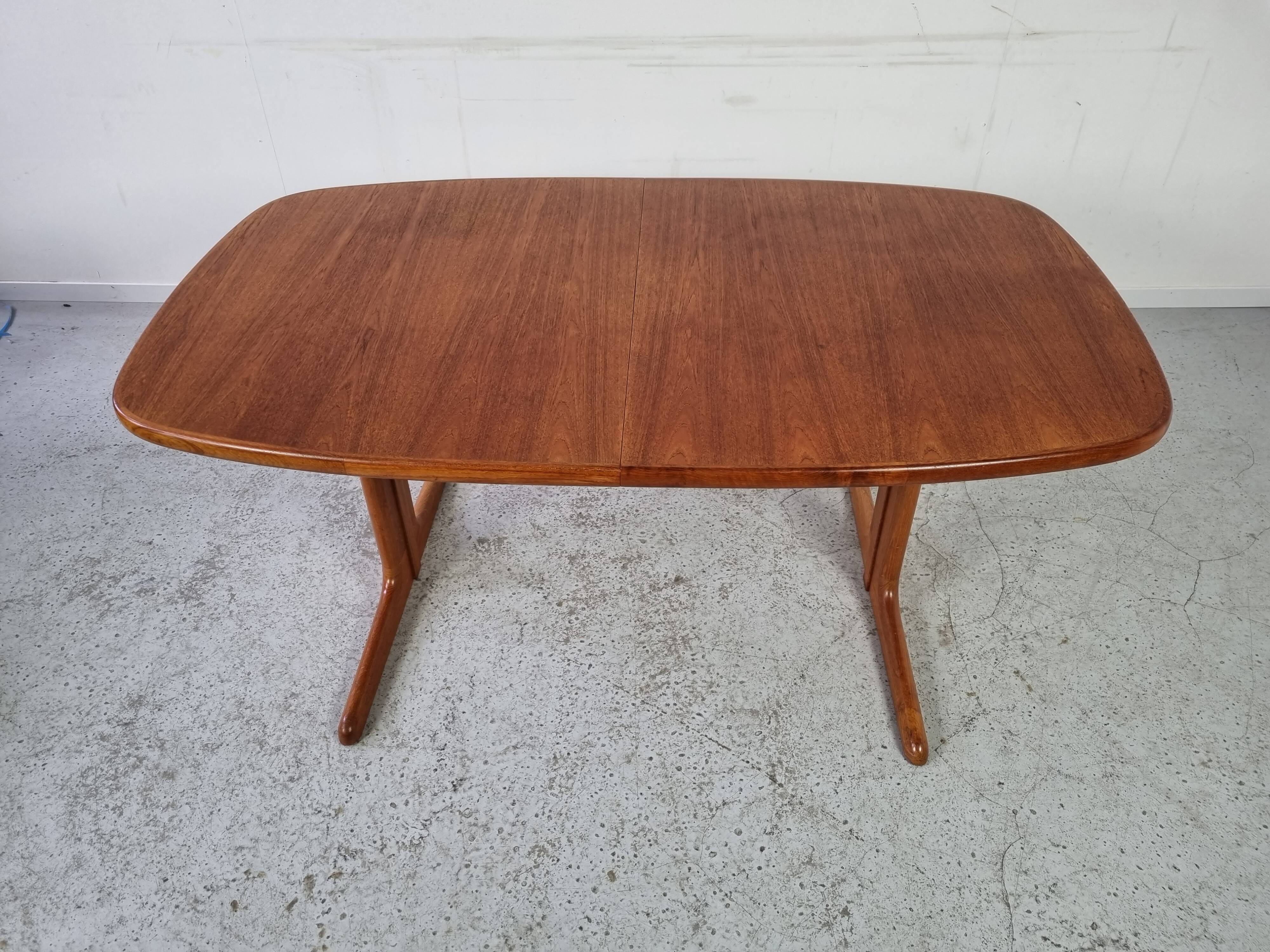 Extendable teak dining table from Dyrlund, Denmark 60s