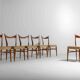 Set of slender mid-century dining chairs with finely curved backs, 1960s