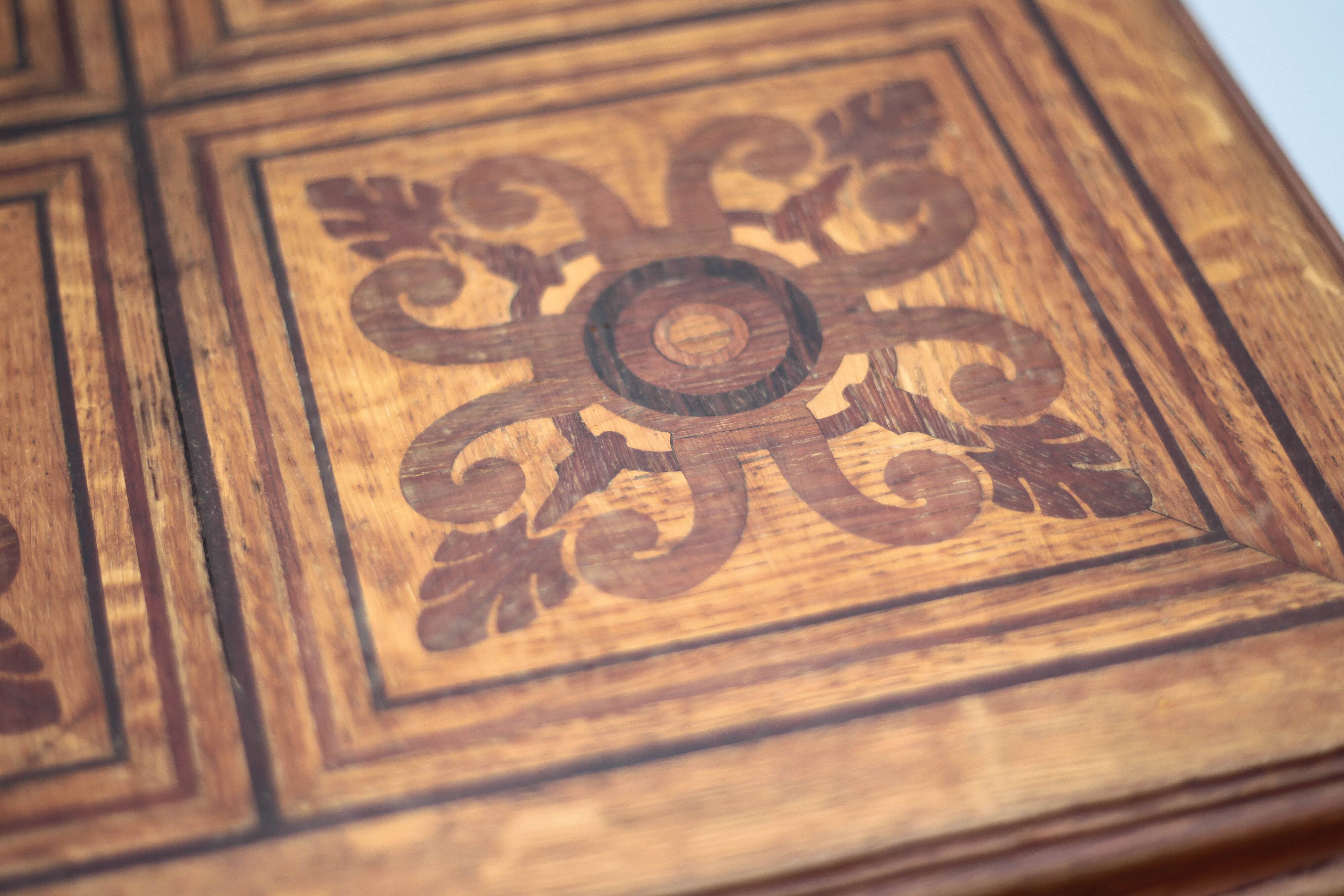 Wood table with marquetry, table with an antique parquet top, antique table.