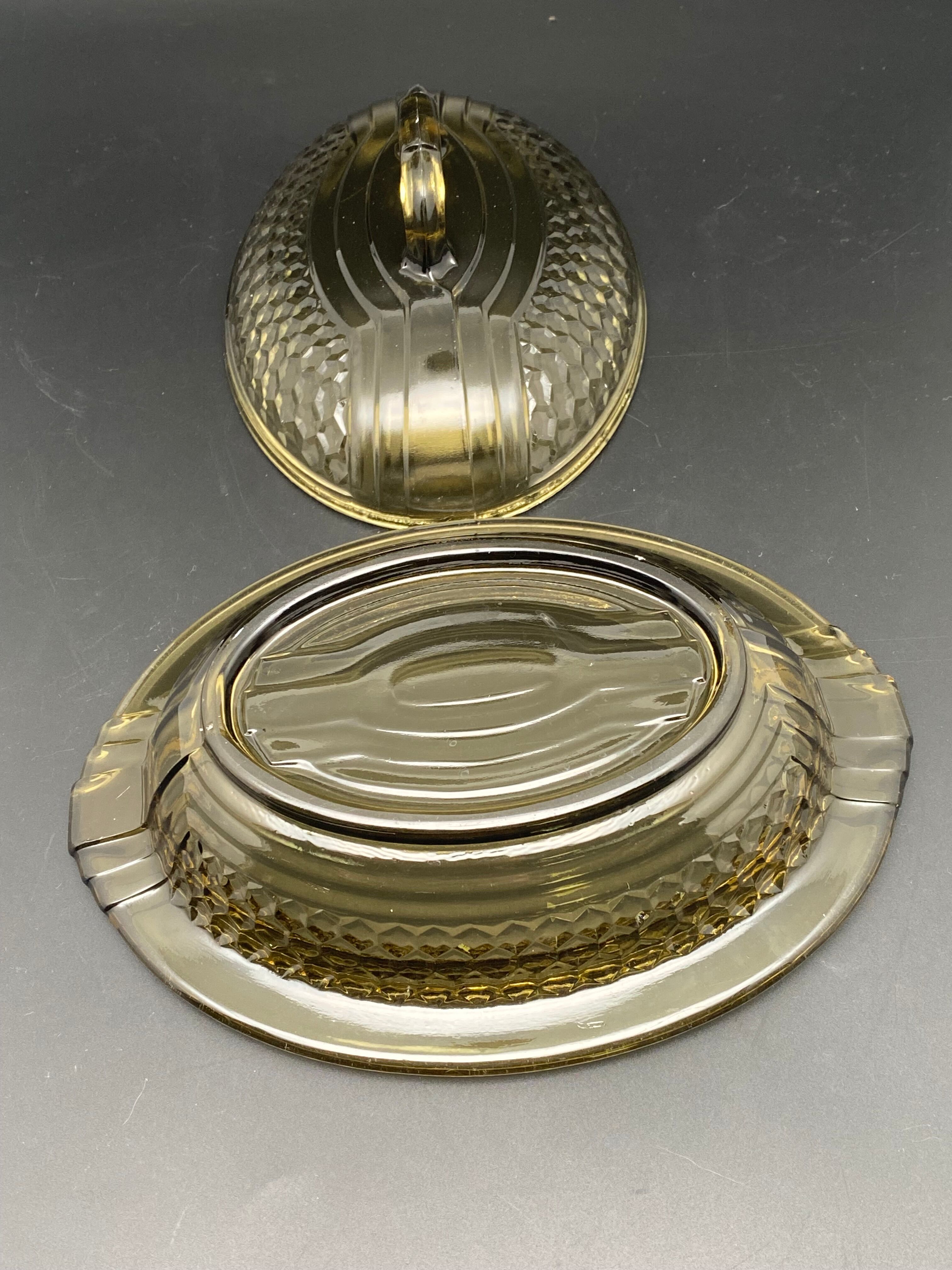 Butter dish or "little casserole" in black colored glass honeycomb pattern