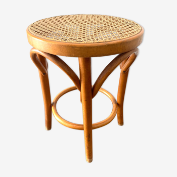 Curved wood and caning stool