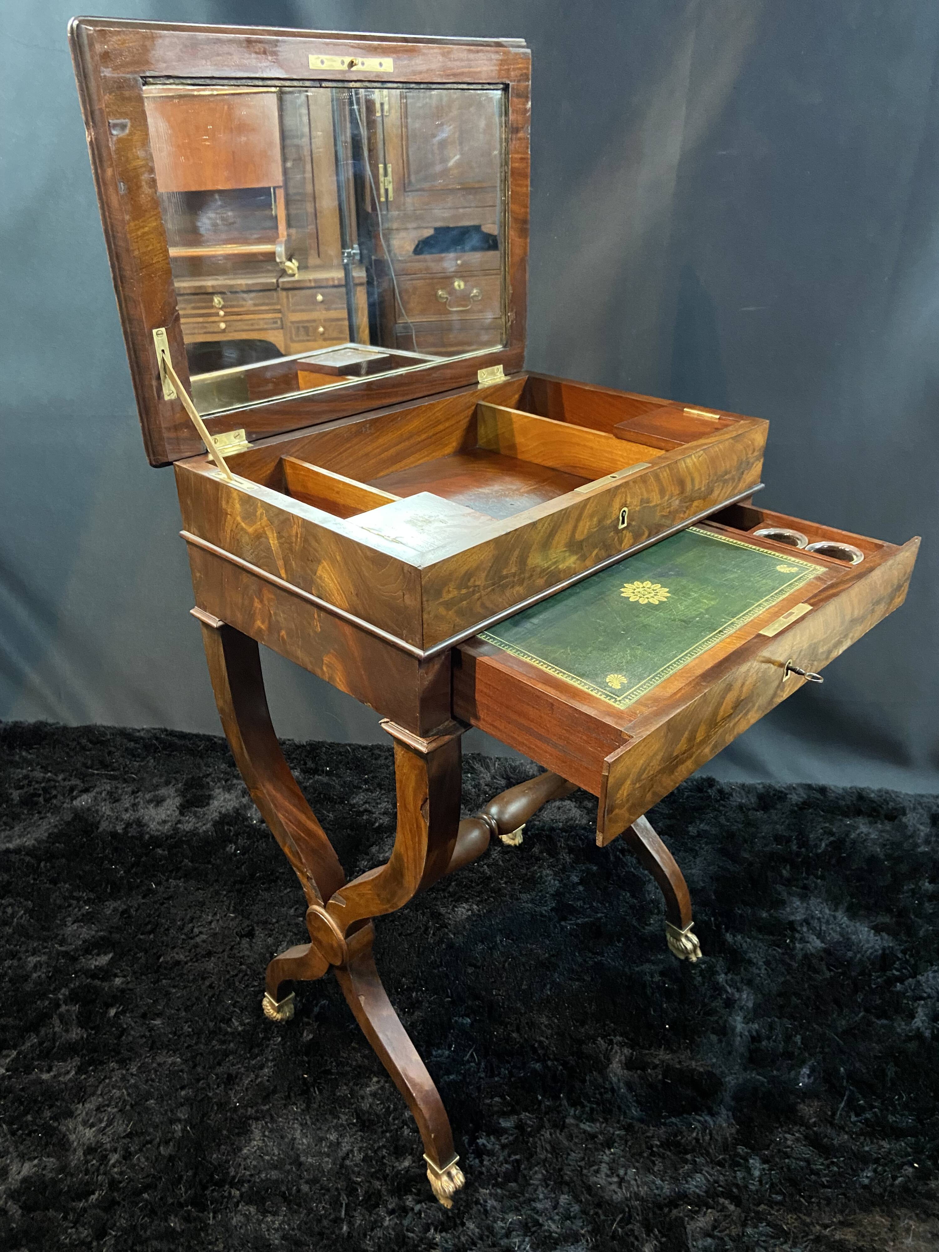 Louis-Philippe period mahogany writing desk with candlestick, 19th century