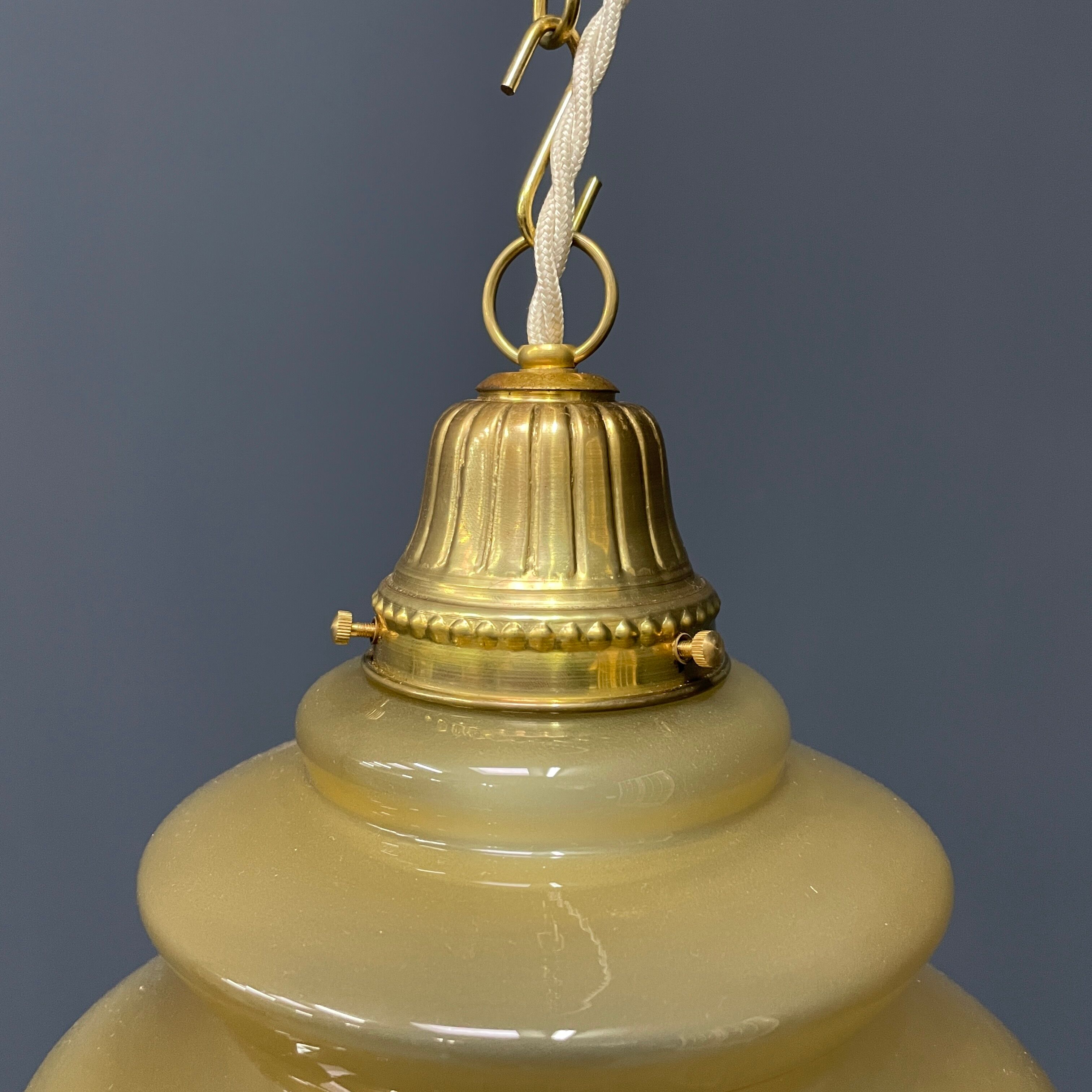 Vintage ocher glass hanging lamps with brass gallery