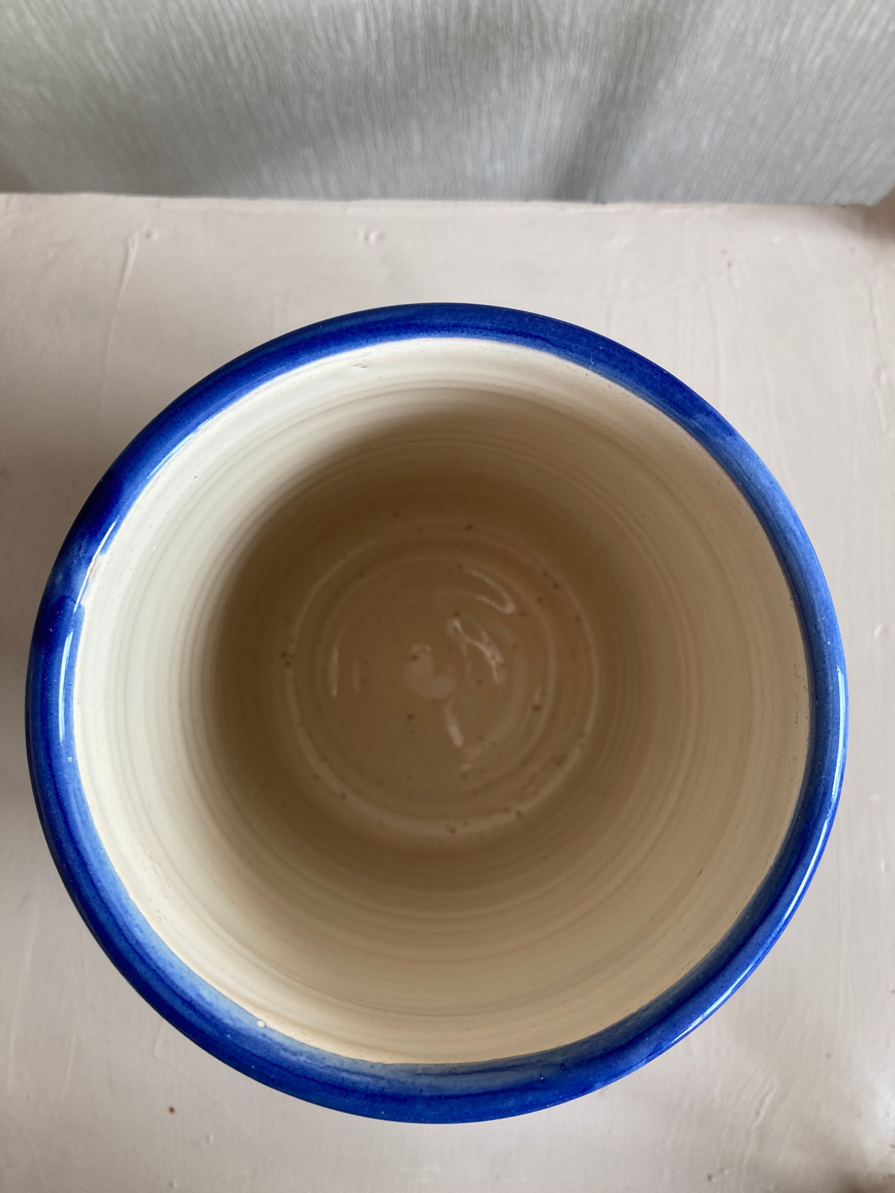 Blue porcelain and mustard vase