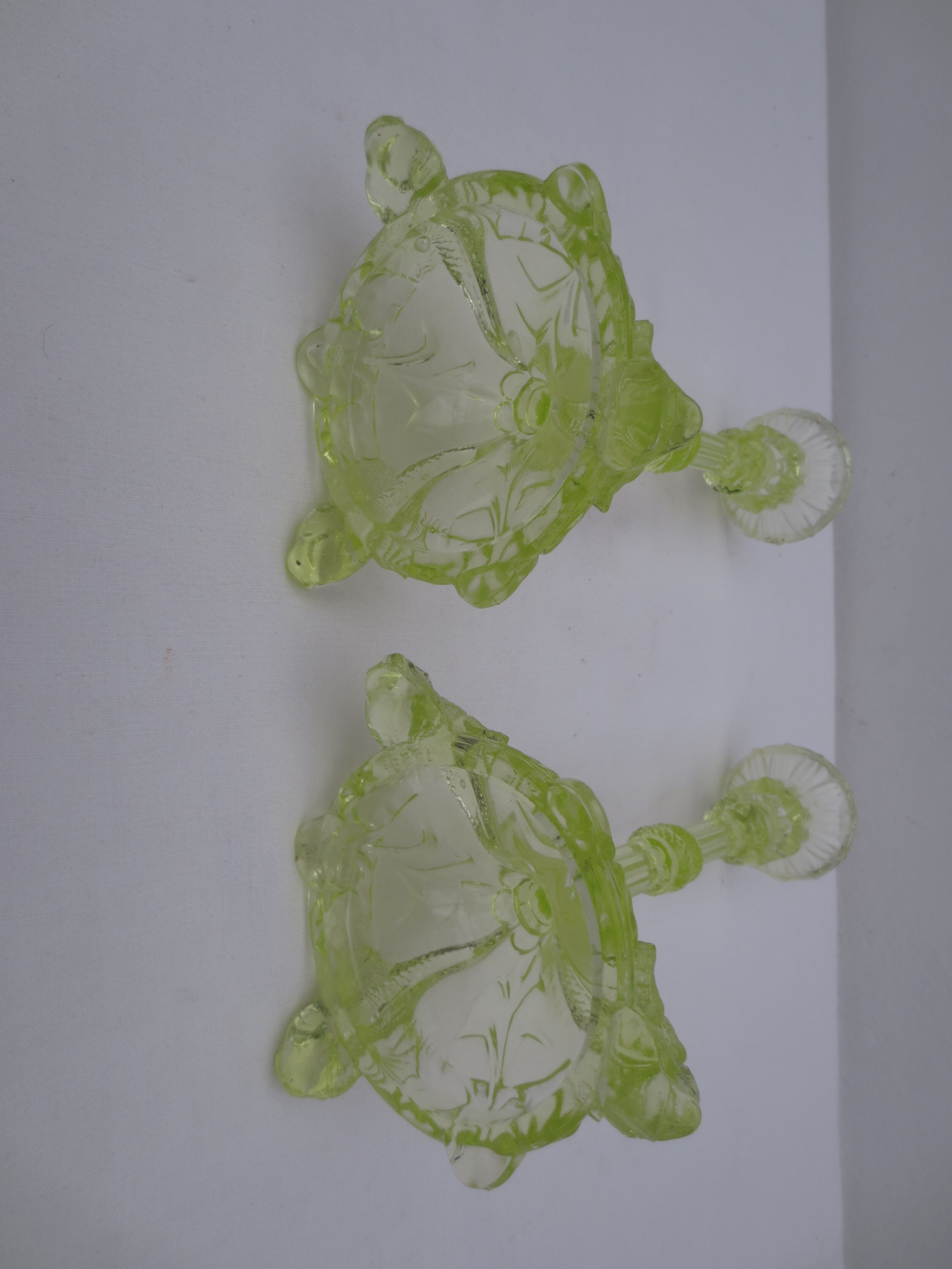 pair of old anise-green glass candlesticks