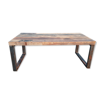 Industrial table with wooden top and metal bases