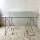 Minimalist glass and metal desk from the 1970s