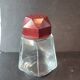 Art Deco glass and bakelite powder shaker in burgundy – 1940s/50s