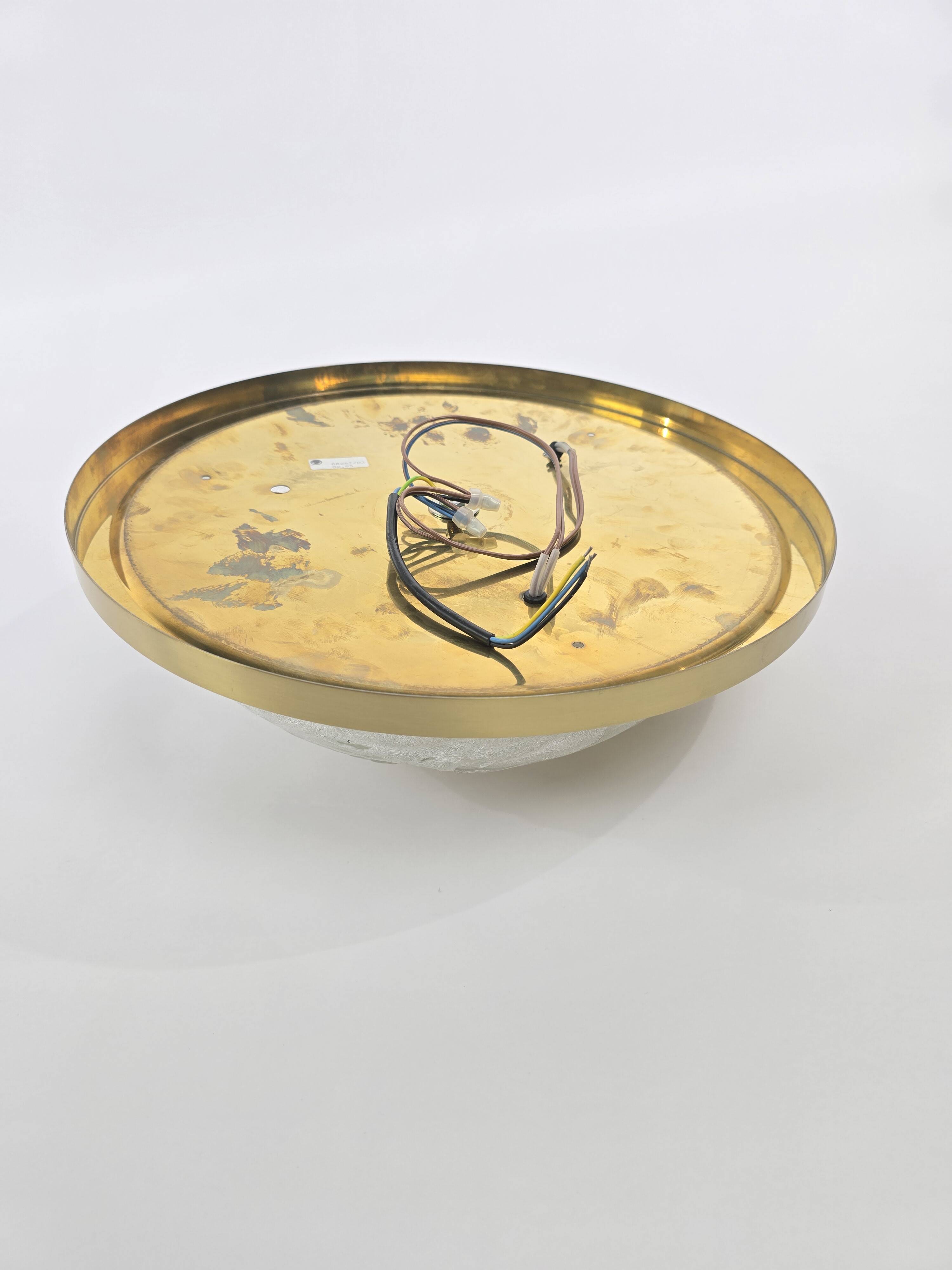 Incroyable applique murale en laiton de Simon & Schelle.