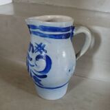 2 antique stoneware pitchers