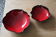 2 plats en terre cuite vernie rouge
