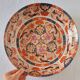 Large deep porcelain plate in Imari style (35.5 cm) with "Phe" decoration.