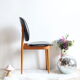 Suite of 6 Chairs Baumann model Pegasus in beech and faux black leather