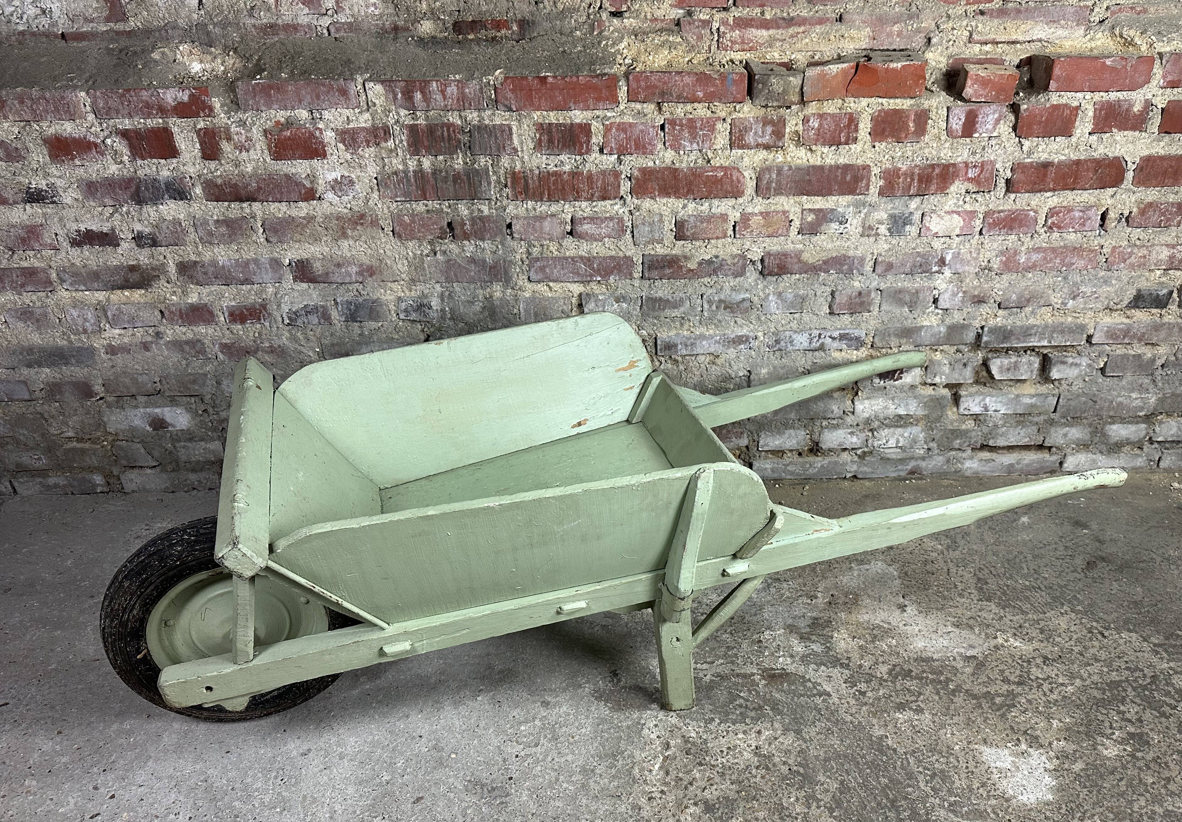 Antique wooden wheelbarrow