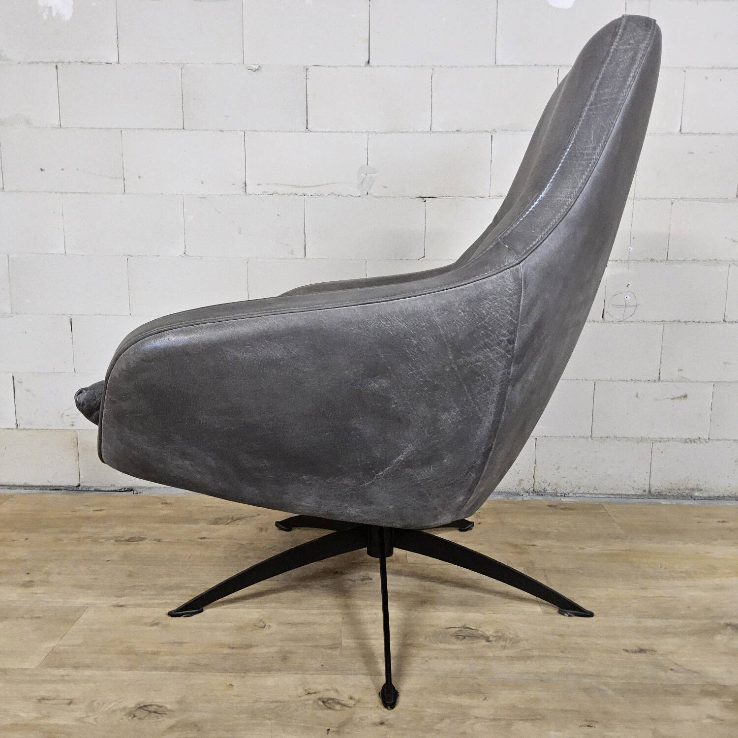 Grey leather swivel armchair Specter by DYYK (Almost new)
