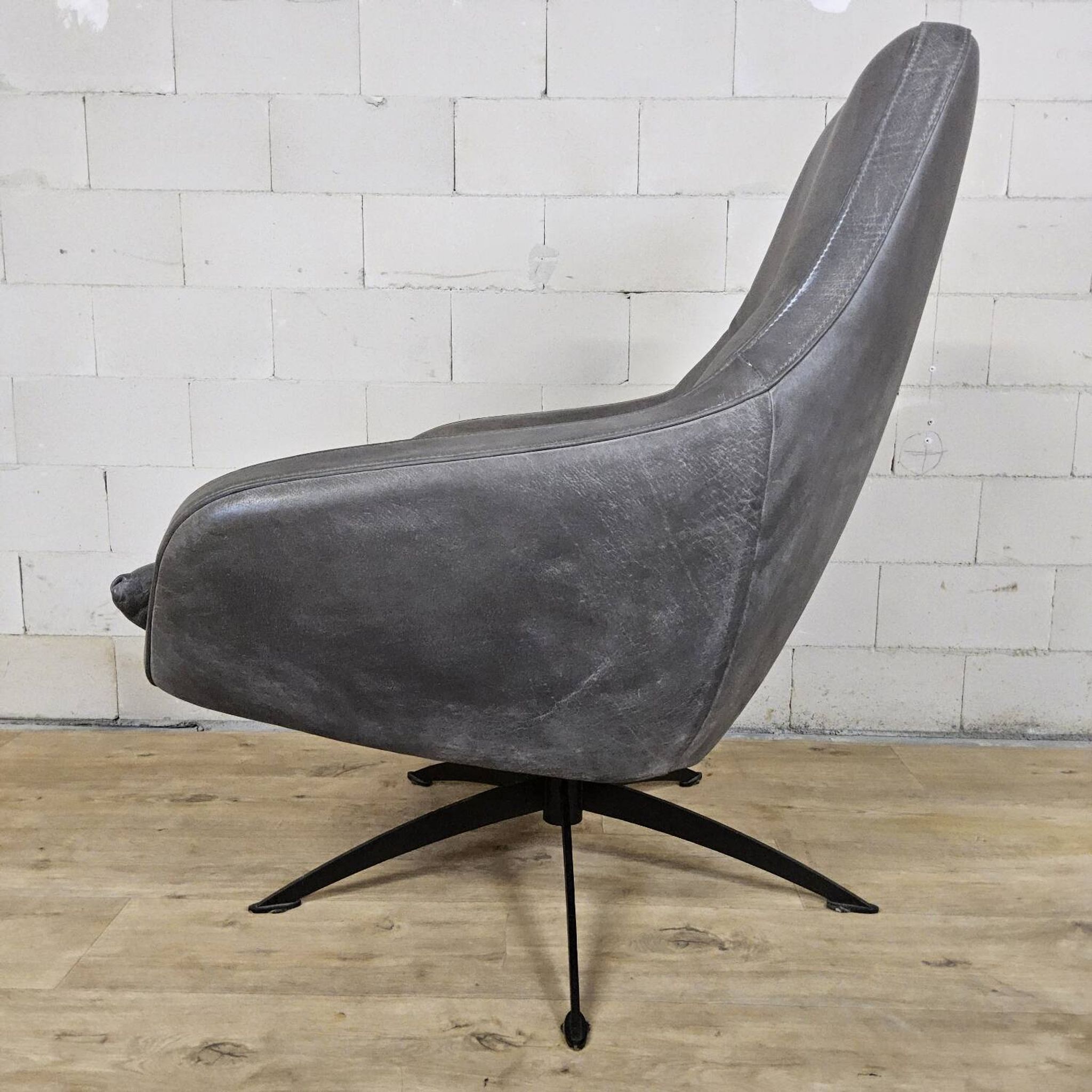 Grey leather swivel armchair Specter by DYYK (Almost new)