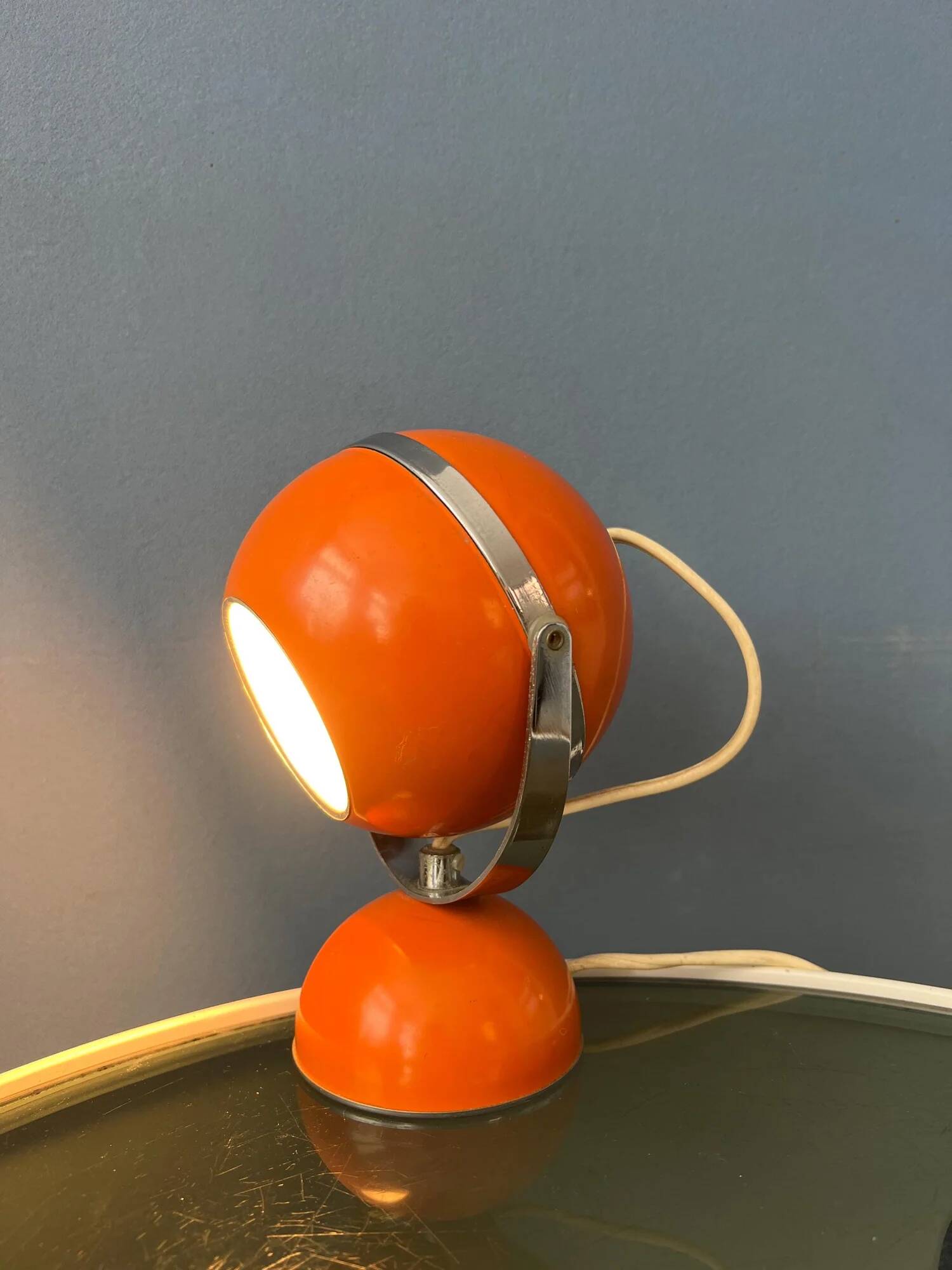 Orange mid-century space age eyeball table lamp