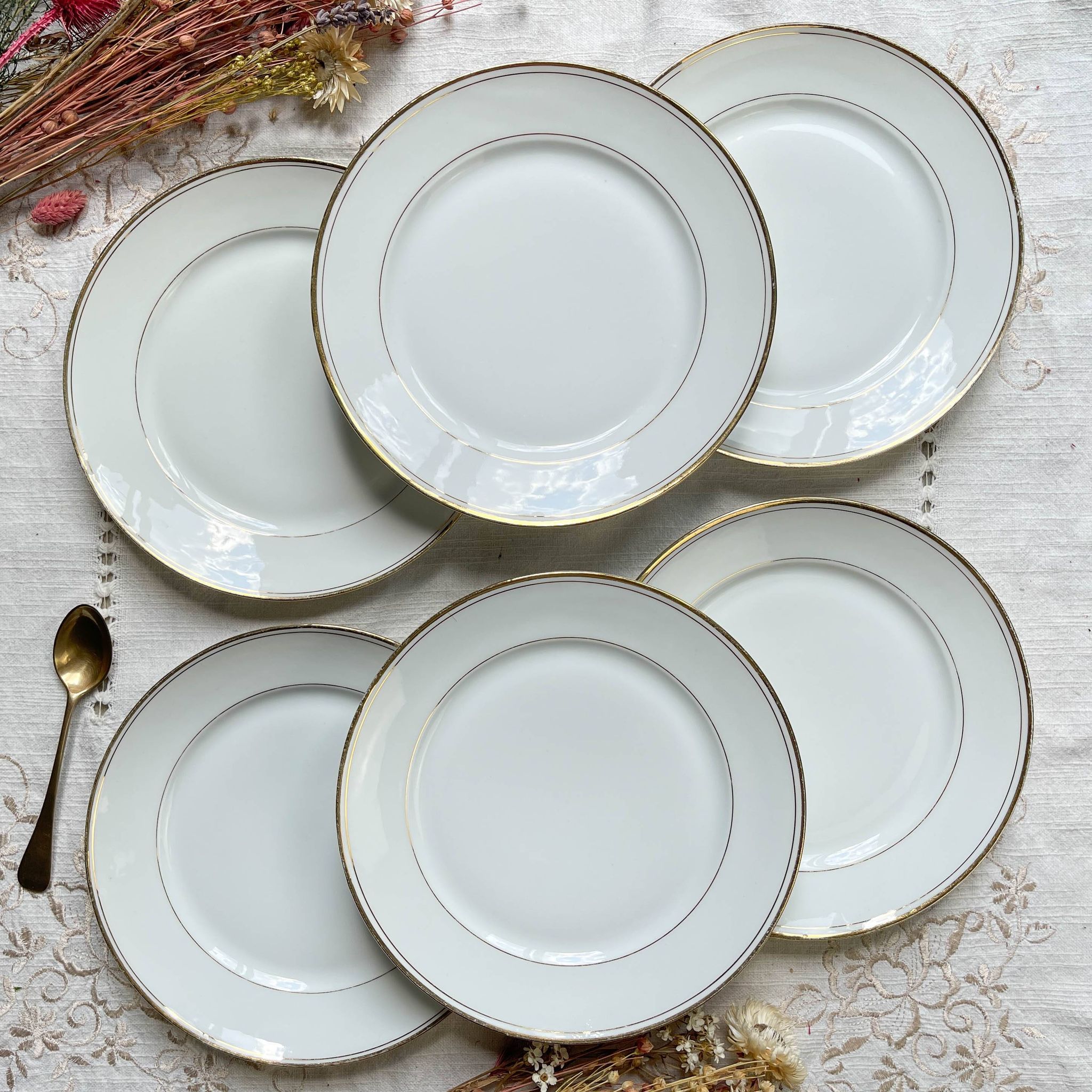 6 Small vintage French plates in golden white Limoges porcelain