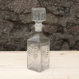Carafe en verre ciselé