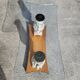 Italian coffee table with glass top, wooden base, and porcelain legs