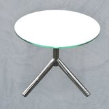 Modernist tripod side table in tempered glass and chrome metal.