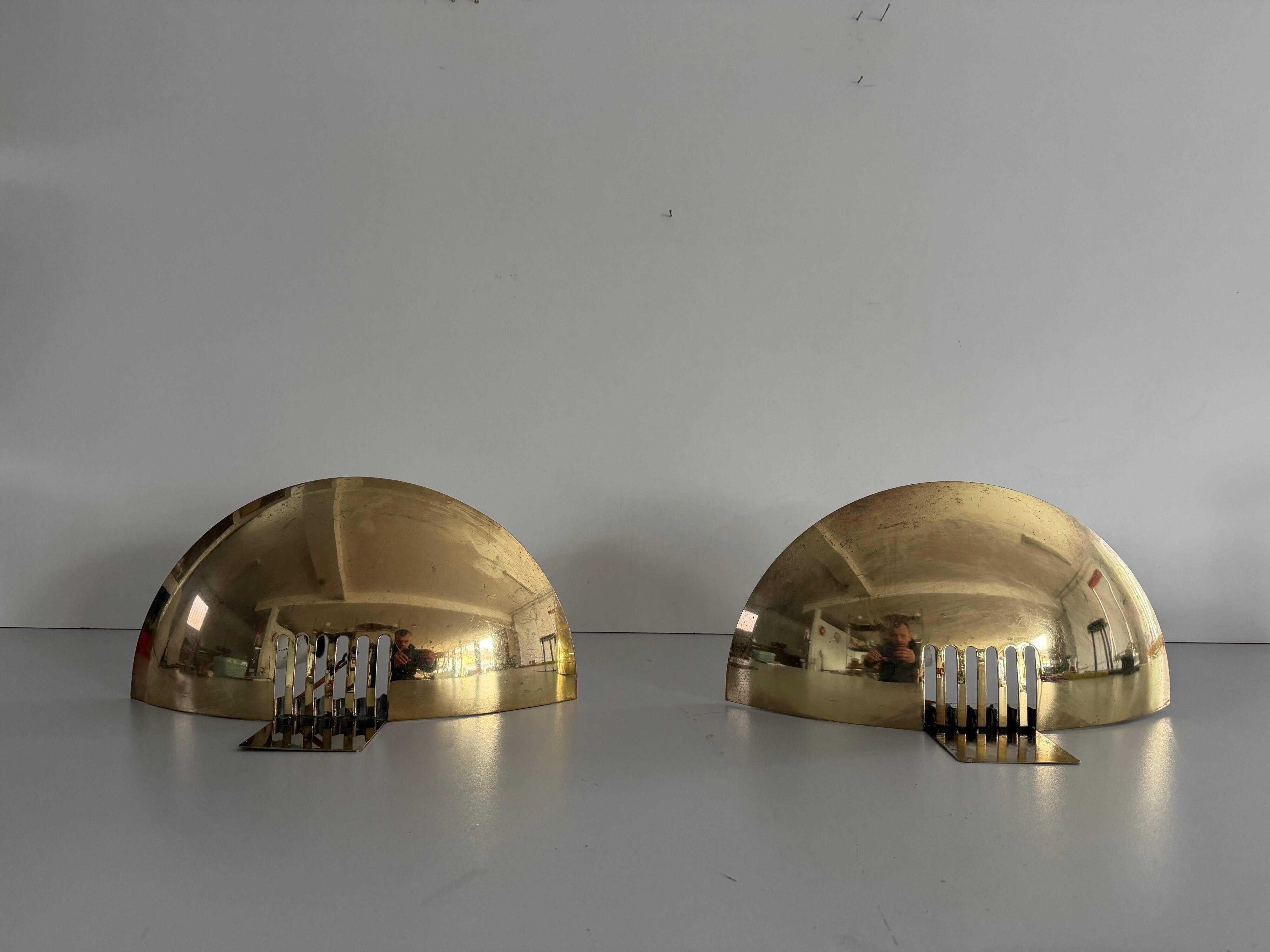 Pair of brass wall sconces from the mid-century by SCE, 1960s, France.