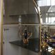 Showcases in lacquered wood, glass and brass  1970s, set of 4