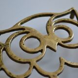Vintage openwork brass trivet in the shape of an owl or owl