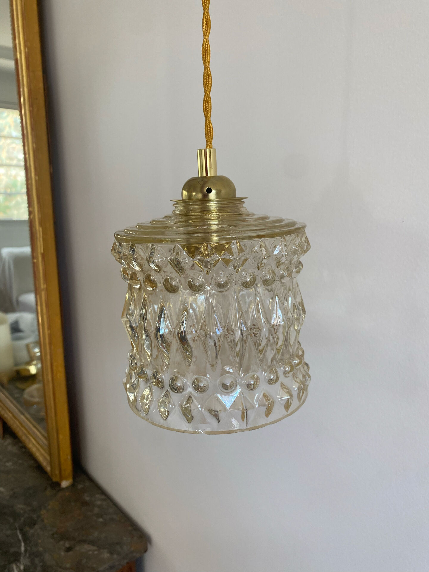 Vintage amber glass suspension globe