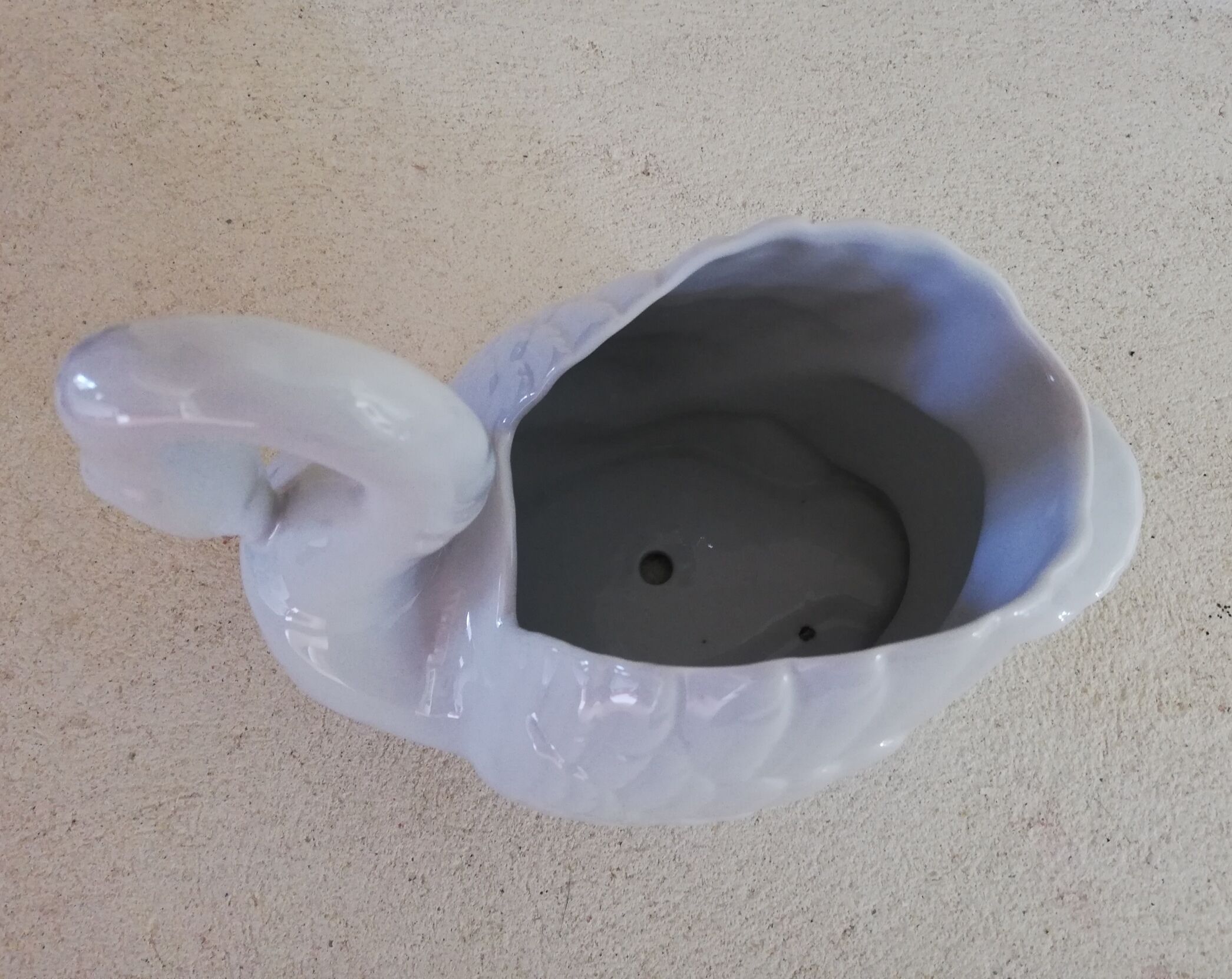 Swan-shaped pot cover