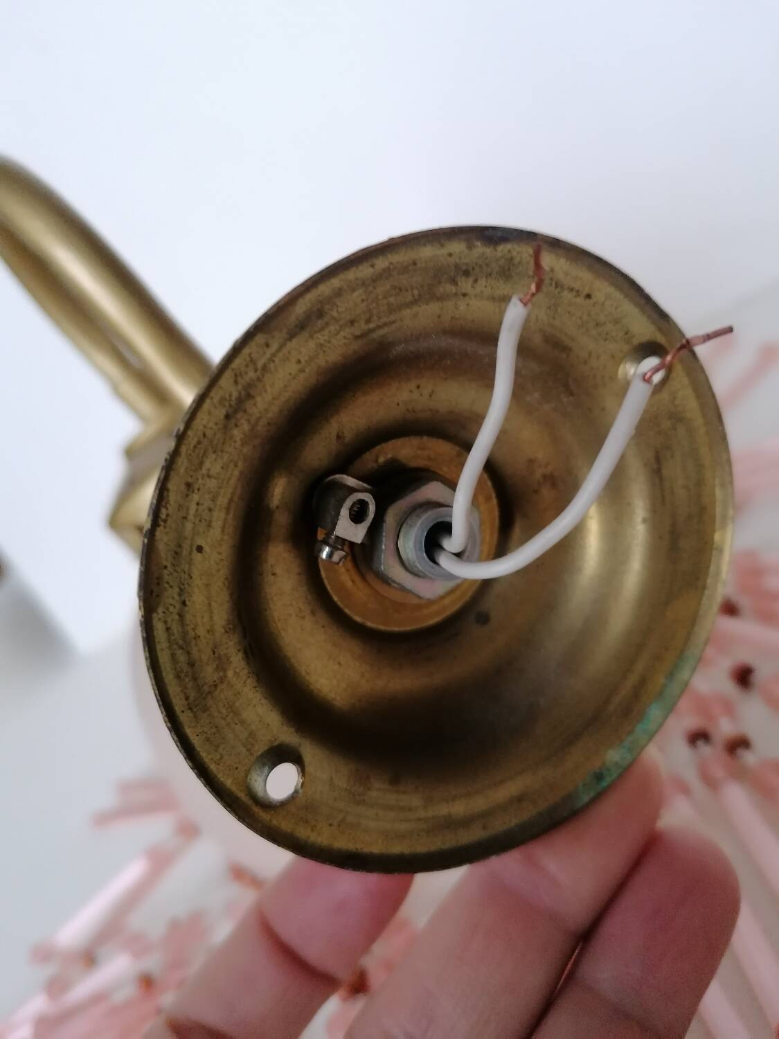 Pink glass wall lamp with garland of pearls