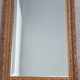 Miroir en bois stuc doré et verre biseauté