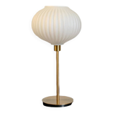 Table lamp with a white striped globe, origami style and a golden foot