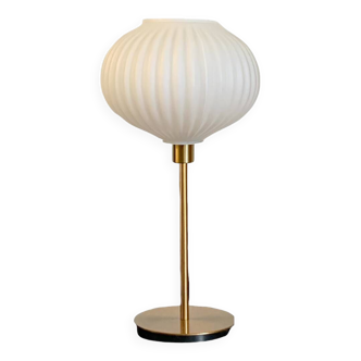 Table lamp with a white striped globe, origami style and a golden foot