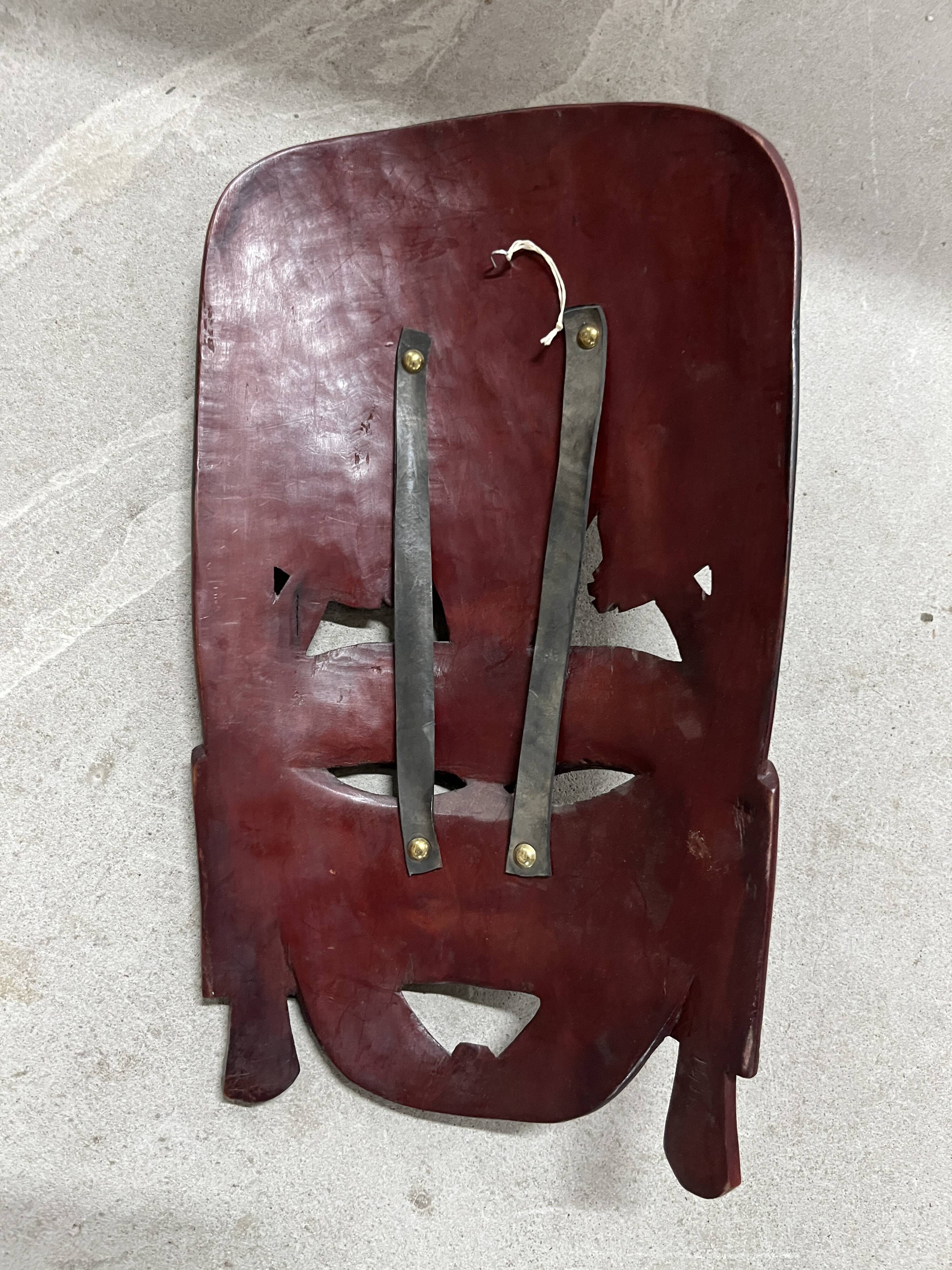 African carved wooden mask from the 1960s